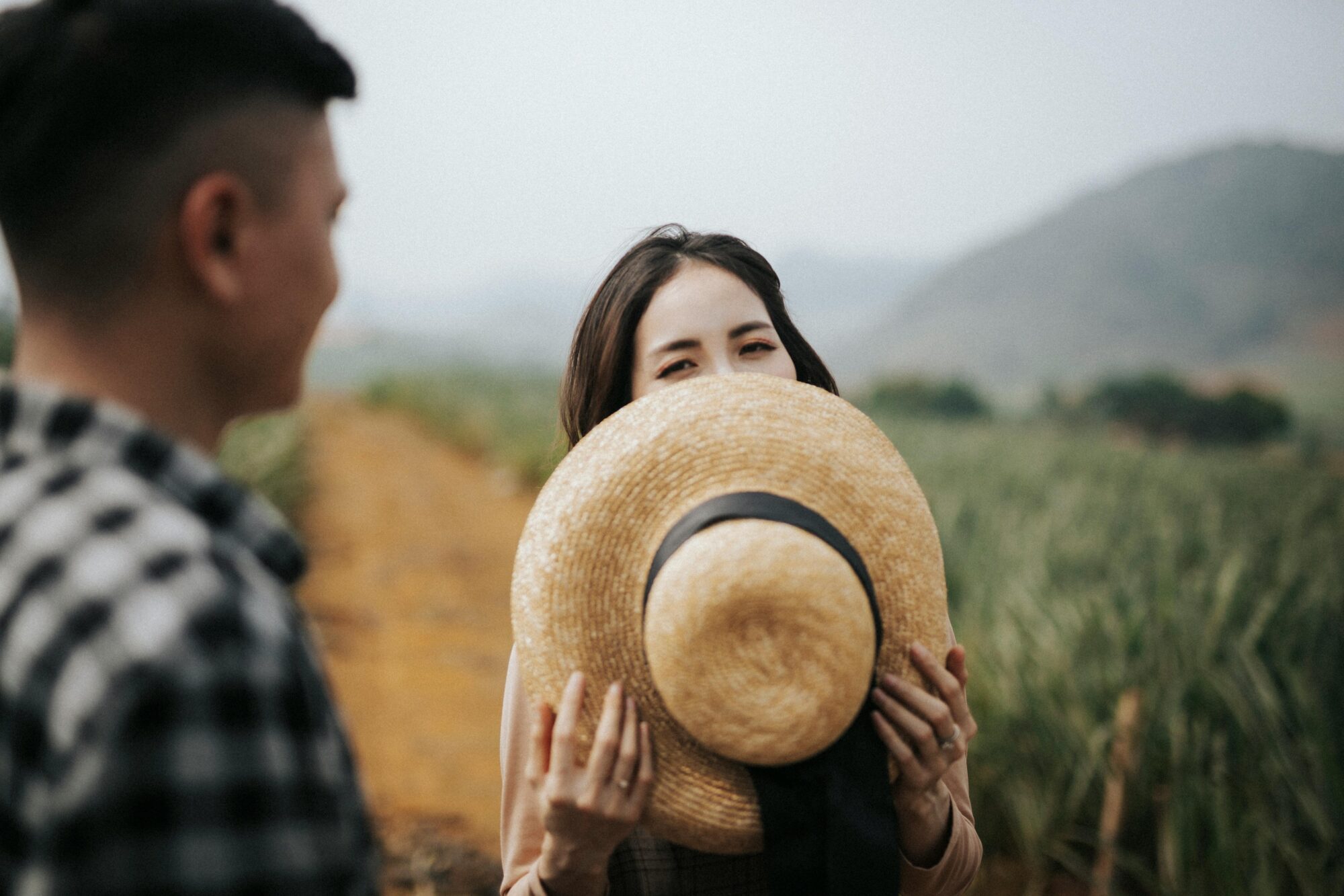 Woman holding a hat