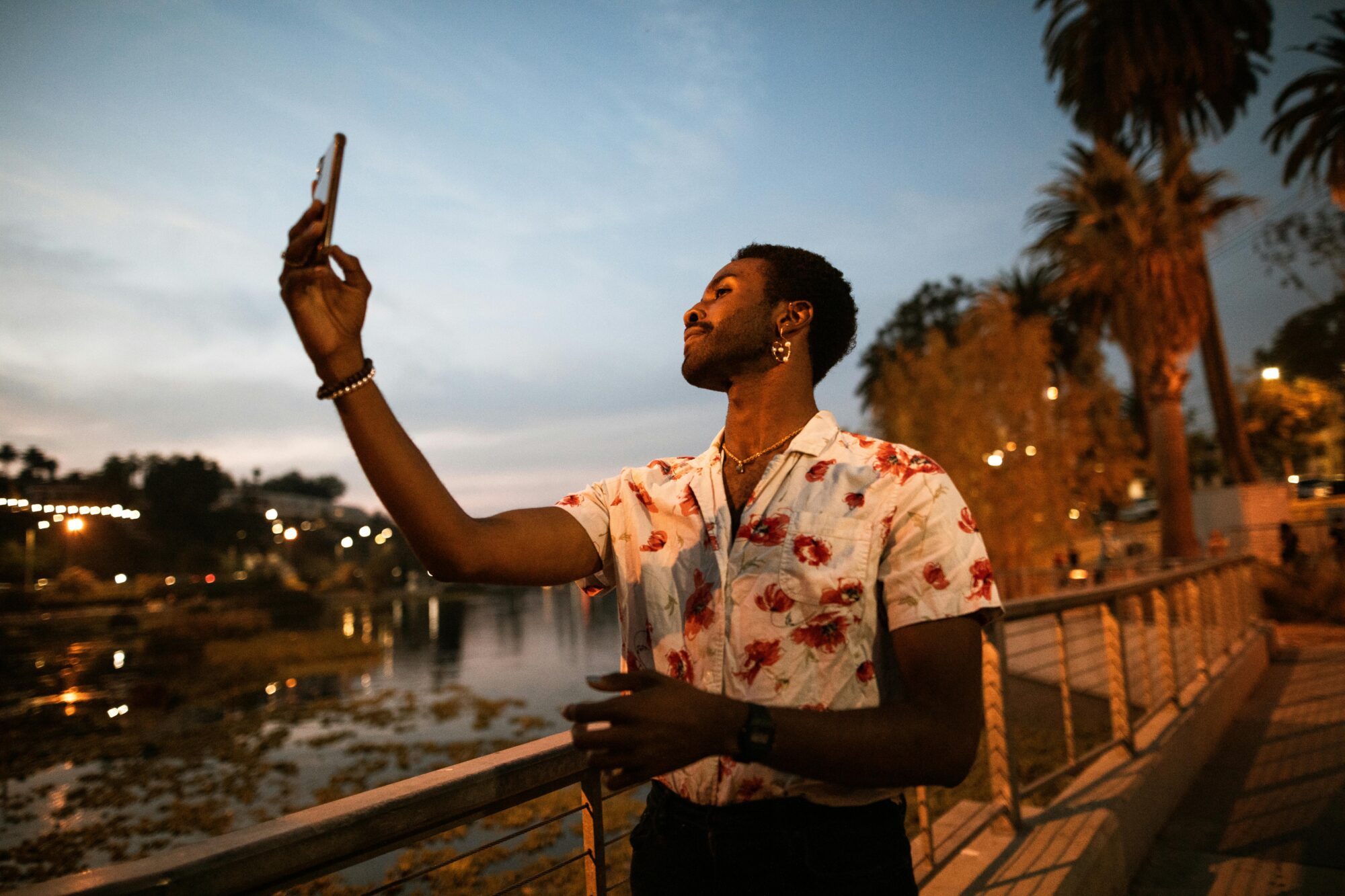 Man recording a video message at a park to use on Zepeel video dating app